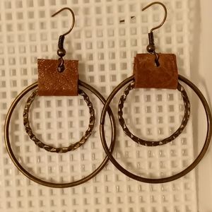 leather earring with circle ring.
